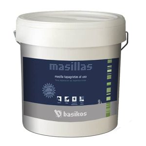 Envase de masilla tapagrietas al uso de la marca Basikos, ideal para reparaciones de imperfecciones en superficies.