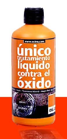 oxino.jpg Botella de tratamiento líquido contra el óxido de la marca Oxi, con etiqueta naranja que destaca su eficacia en la eliminación de óxido en superficies metálicas. Ideal para mantenimiento industrial y doméstico.